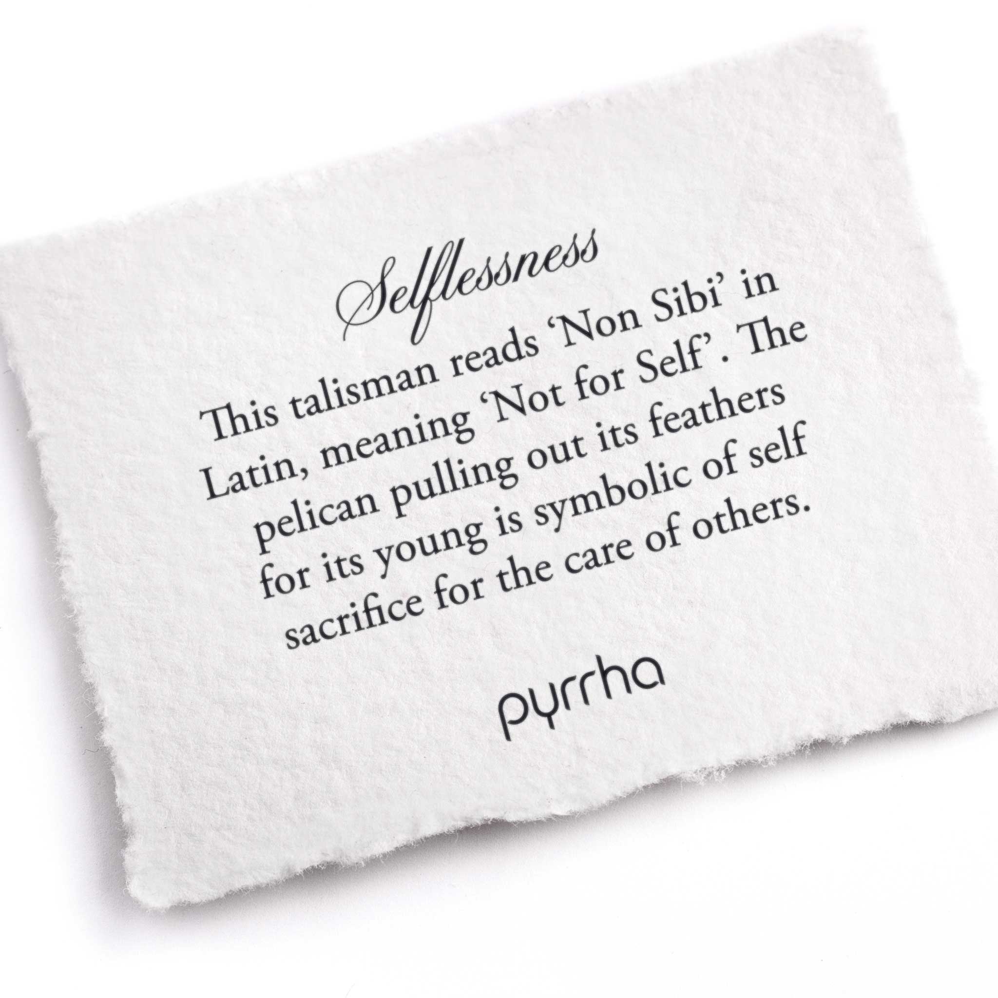 A hand-torn, letterpress printed card describing the meaning for Pyrrha's Selflessness Talisman