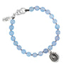 A blue beaded bracelet featuring our sterling silver Tireless talisman.