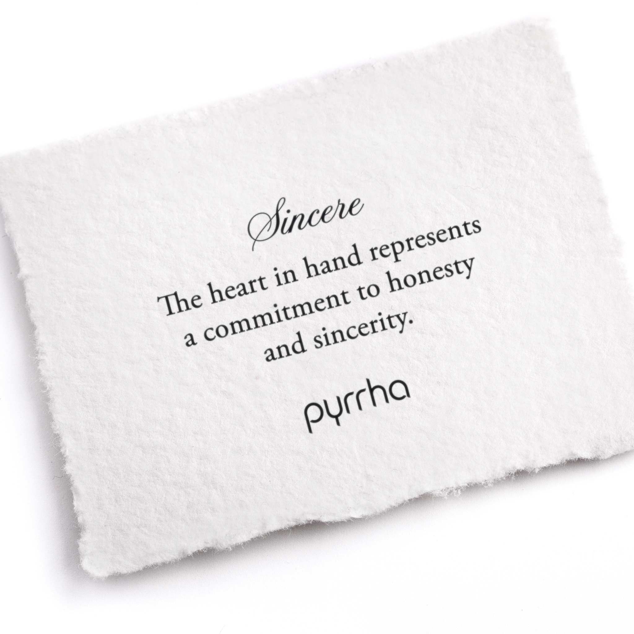 A hand-torn, letterpress printed card describing the meaning for Pyrrha's Sincere Appreciation Talisman