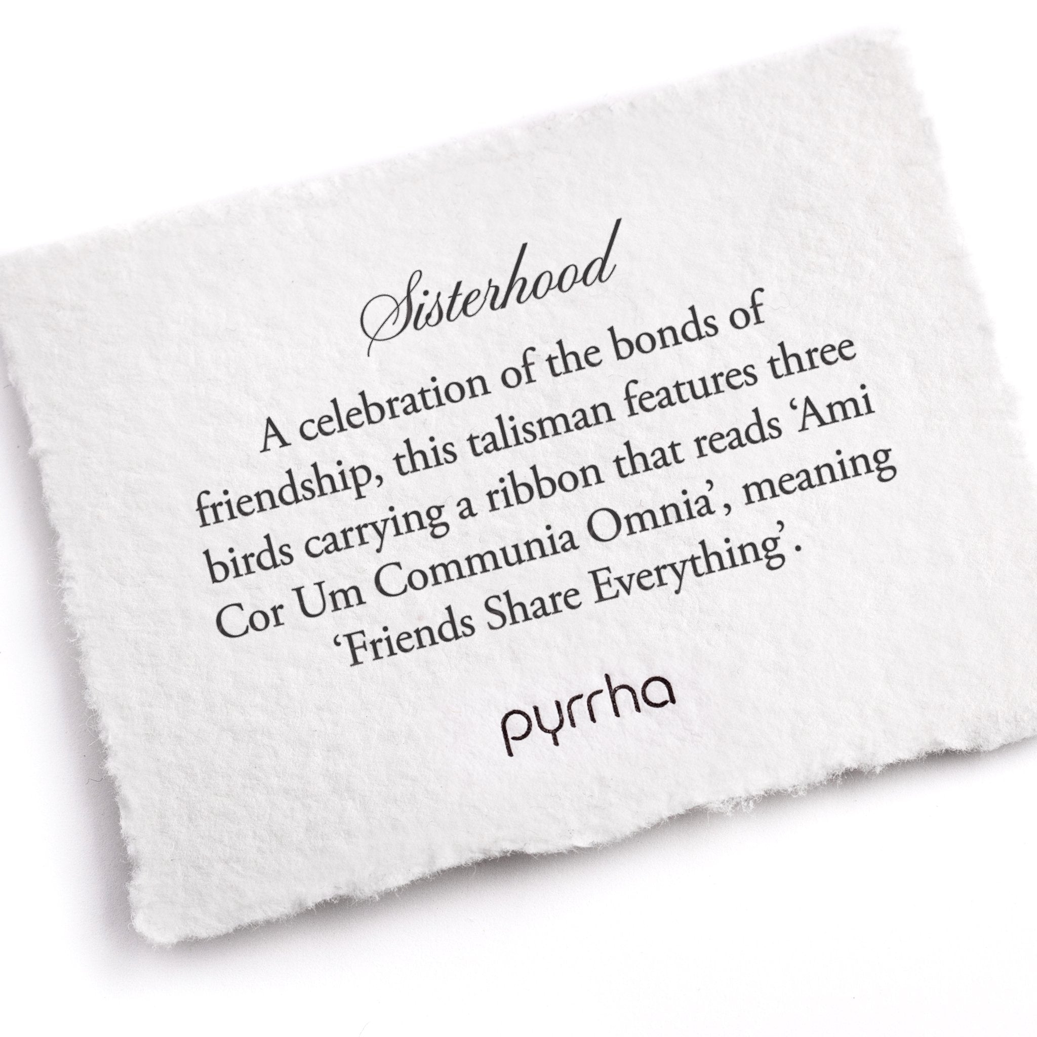 A hand-torn, letterpress printed card describing the meaning for Pyrrha's Sisterhood Talisman Necklace