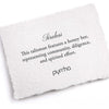 A hand-torn, letterpress printed card describing the meaning for Pyrrha's Tireless Talisman