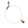A string of ivory freshwater pearls with our Vitality talisman.