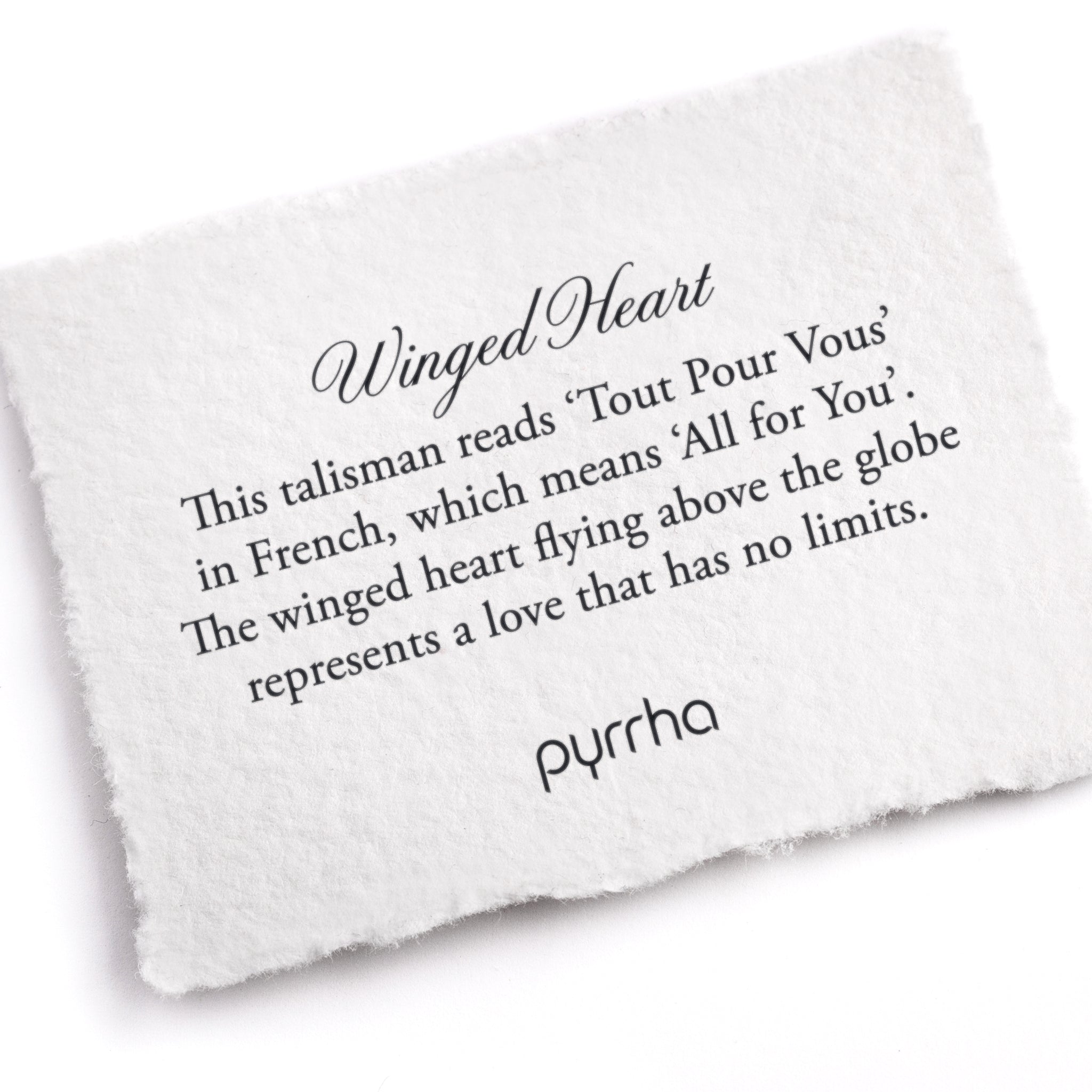 A hand-torn, letterpress printed card describing the meaning for Pyrrha's Winged Heart Talisman